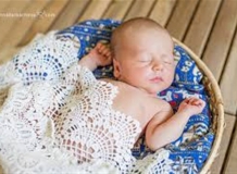 Newborn babyboy in the basket